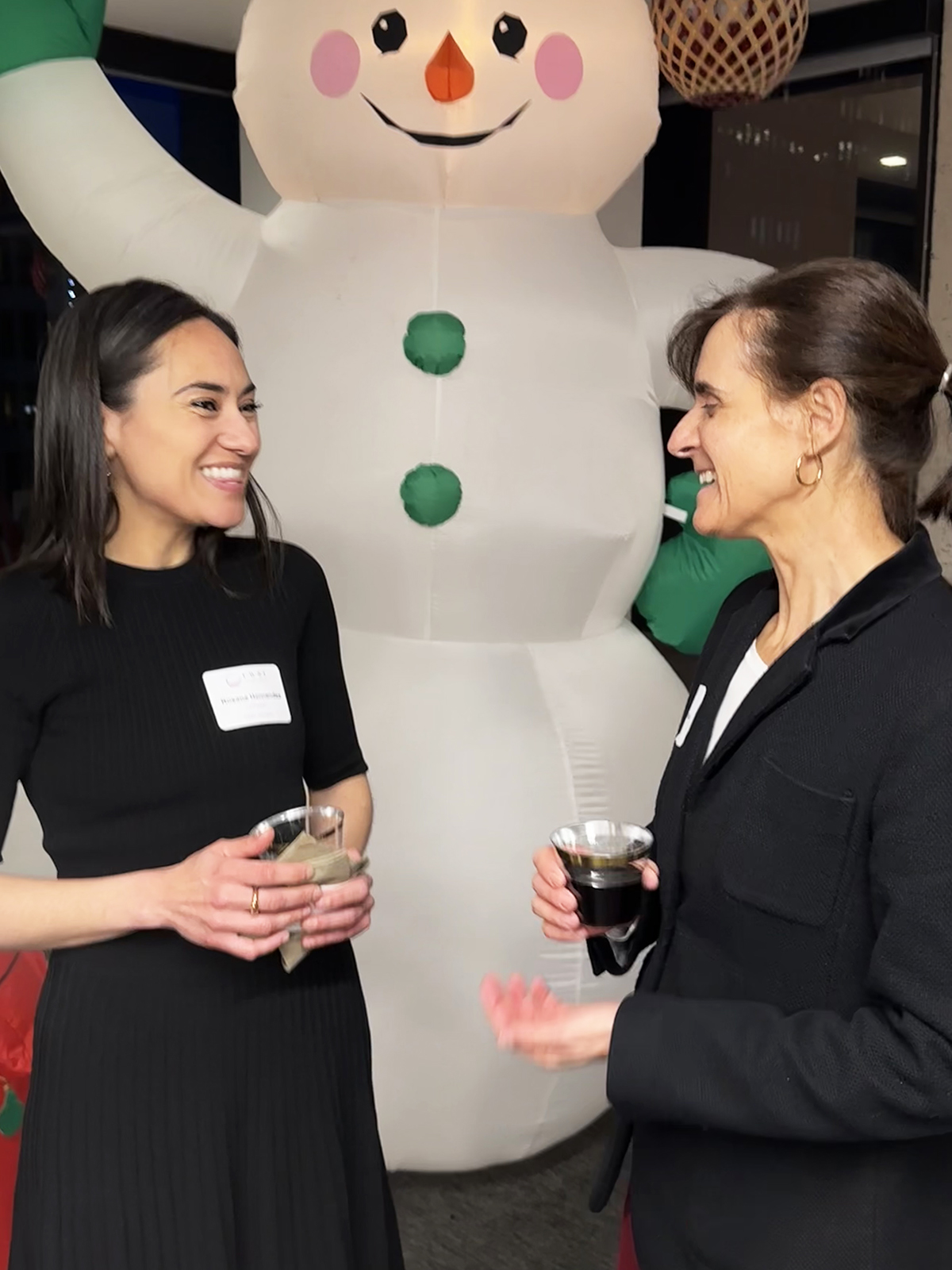 women at holiday party